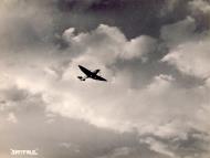 Asisbiz Spitfire HFVII c wing over its base in Italy 01
