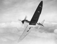 Asisbiz Factory fresh Spitfire MkIa P9450 showing black wing half tone camouflage in flight April 1940 web 01