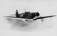 Asisbiz Factory fresh Spitfire MkIa P9450 showing black wing half tone camouflage in flight April 1940 web 02