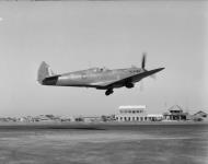 Asisbiz Recon Spitfire PRXI RAF 681Sqn T taking off from Chittagong India web 01