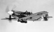 Asisbiz Spitfire LFXII RAF MB878 during trials with 500lb bomb in 1943 web 01