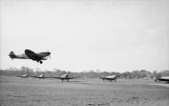 Asisbiz Spitfire MkIX RAF 93Sqn HN comes in to land at Lago web 01