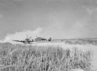 Asisbiz Spitfire MkIX taxing at B2 Bazenville Normandy 1944 IWM CL182