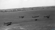 Asisbiz Spitfire MkVb RAF 122Sqn MTS MTO MTX MTV taking off at Hornchurch Essex May 1942 IWM CH5761a