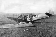 Asisbiz Spitfire MkVb force landed being inspected by DAK soldiers 1943 web 01