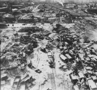 Asisbiz Target 8AF bomb damaged locomotives and rail cars at a railway yard FRE11877