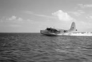 Asisbiz Sunderland III RAF 230Sqn S EJ143 taking off at Addu Atoll Maldive Islands 01