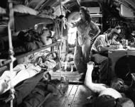 Asisbiz Curtiss C 46 Commando conducting an aerial evacuation of wounded American troops from Manila 1945 01