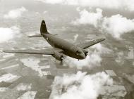 Asisbiz Curtiss C 46 Commando with standard early war camouflage in flight 01