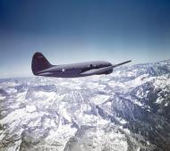 Asisbiz WWII color photo of USAAF 41 12352 Curtiss C 46A Commando over the Sierra Nevada Mountains 01