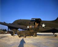 Asisbiz WWII color photo of USAAF 41 20088 Douglas C 53 Skytrooper parked on a ramp foreground 1945 01