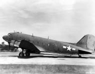 Asisbiz 43 15829 Douglas C 47A Skytrain carrying a damaged wing clamped under the belly China 1944 NA091