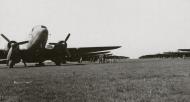 Asisbiz 43 15158 Douglas C 47s 442TCG305TCS 4JP lined up along the runway at an airfield in Germany 20th April 1945 02