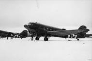 Asisbiz Douglas C 47 Skytrain 27ATG86ATS left aircraft and 321ATS Sad Sack on the right winter 1944 FRE11729