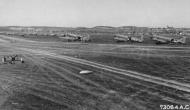 Asisbiz Douglas C 47s lined up along the runway at an airfield in Germany 20th April 1945 01