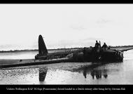 Asisbiz Wellington RAF 301Sqn forced landed in a Dutch estuary after being hit by German flak