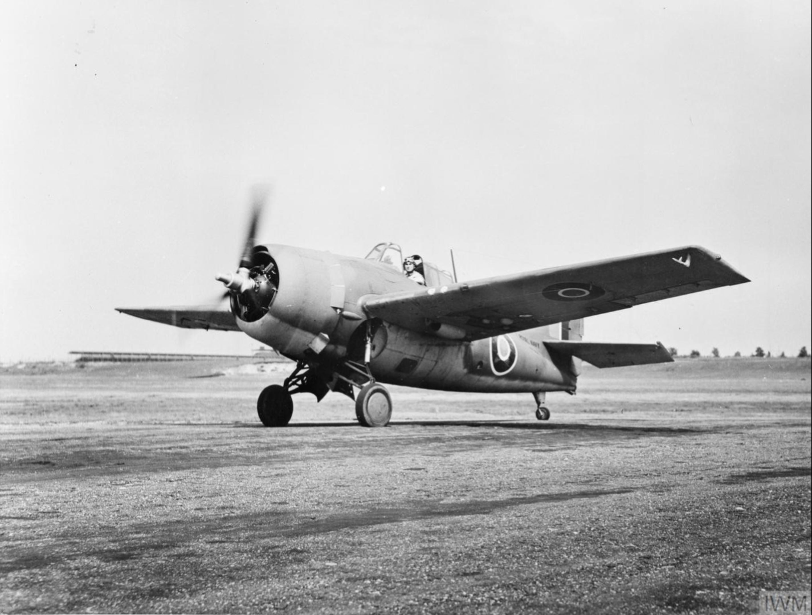 Fleet Air Arm Martlet taxiing at a US NAS IWM A19800