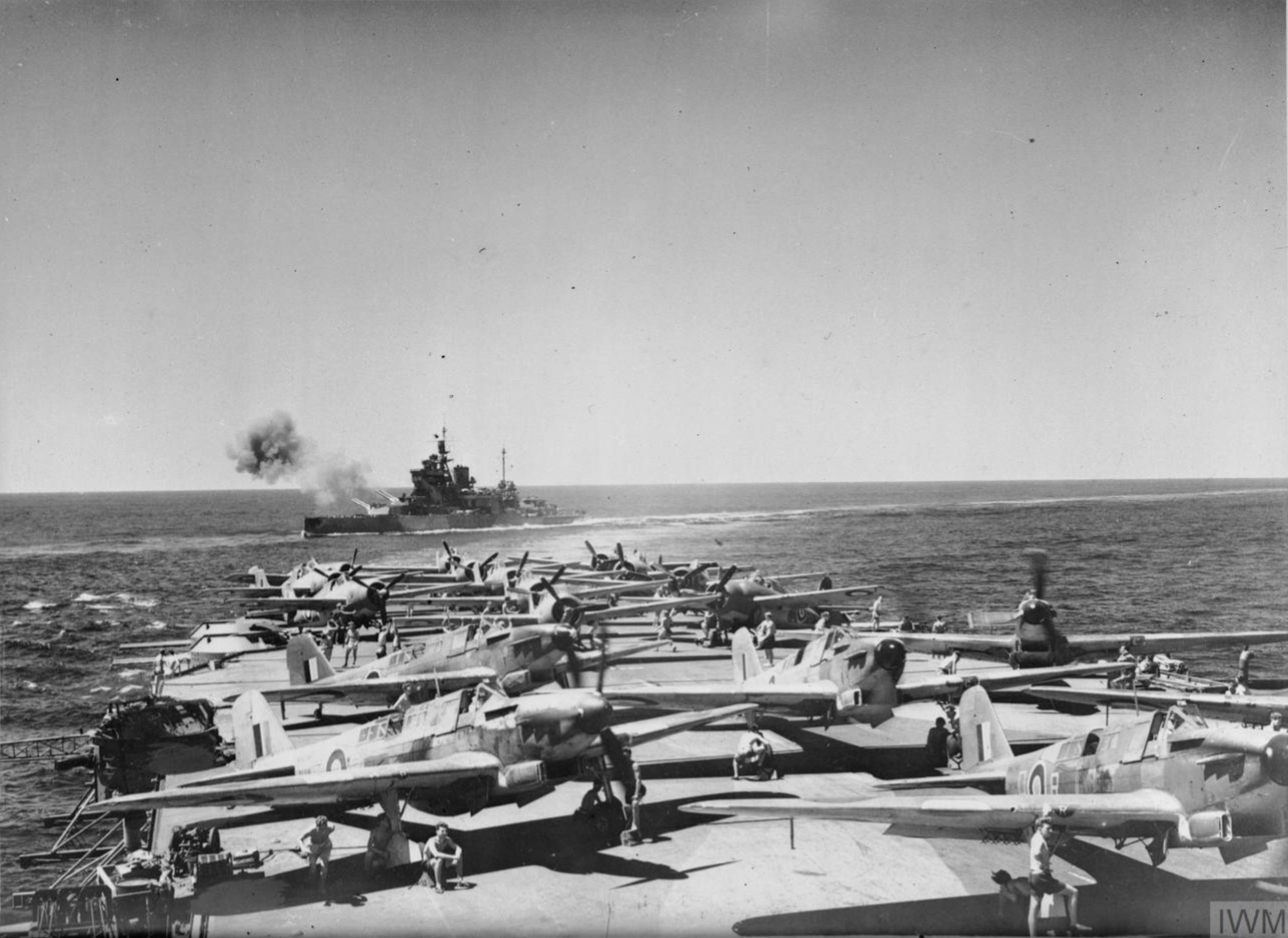 HMS Illustrious flight deck with FAA 806NAS Fairey Fulmars with HMS Valiant astern Indian Ocean IWM A15125A