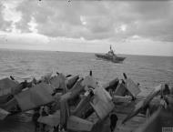 Asisbiz Fleet Air Arm Martlets aboard HMS Trumpeter with HMS Implacable foreground Dec 1944 IWM A26803