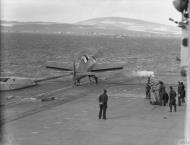 Asisbiz Fleet Air Arm Martlet 882NAS being prepared for launch HMS Victorious Scotland 23 25th Sep 1942 IWM A12117