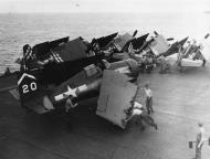 Asisbiz General Motors FM 2 Wildcat VC 80 White 20 with VC 71 background aboard CVE 75 USS Hoggatt Bay 1945 01
