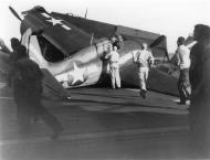 Asisbiz General Motors FM 2 Wildcat VC 80 White x landing mishap CVE 61 Manila Bay 1944 01