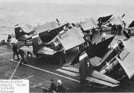 Asisbiz General Motors FM 2 Wildcat VC 84 White 7,13 and 18 preparing to launch CVE 93 USS Makin Island 1945 01