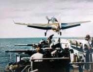 Asisbiz USS Makin Island (CVE 93) TBM Avengers VC 84 takes off Ie Shima Ryukyu Islands on 16th April 1945 NH 69419