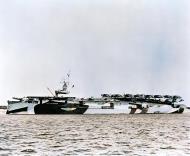 Asisbiz USS Hoggatt Bay (CVE 75) at anchor with her flightdeck loaded with Grumman TBF Avengers UA 57123