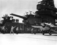 Asisbiz Grumman F4F 3 Wildcat VF 3 White 20 prepares to leave carrier as take off signal officer gives GO sign 01