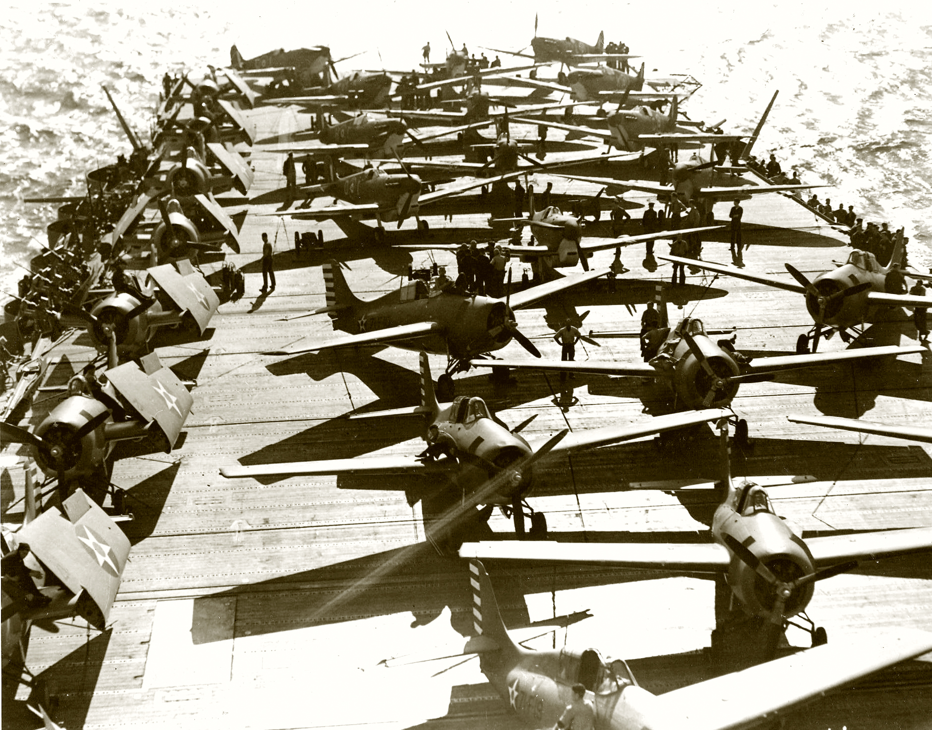 USN VF-71 Grumman F4F-4 Wildcats 71F19 and Spitfires aboard USS Wasp CV7 off Malta Apr 1942
