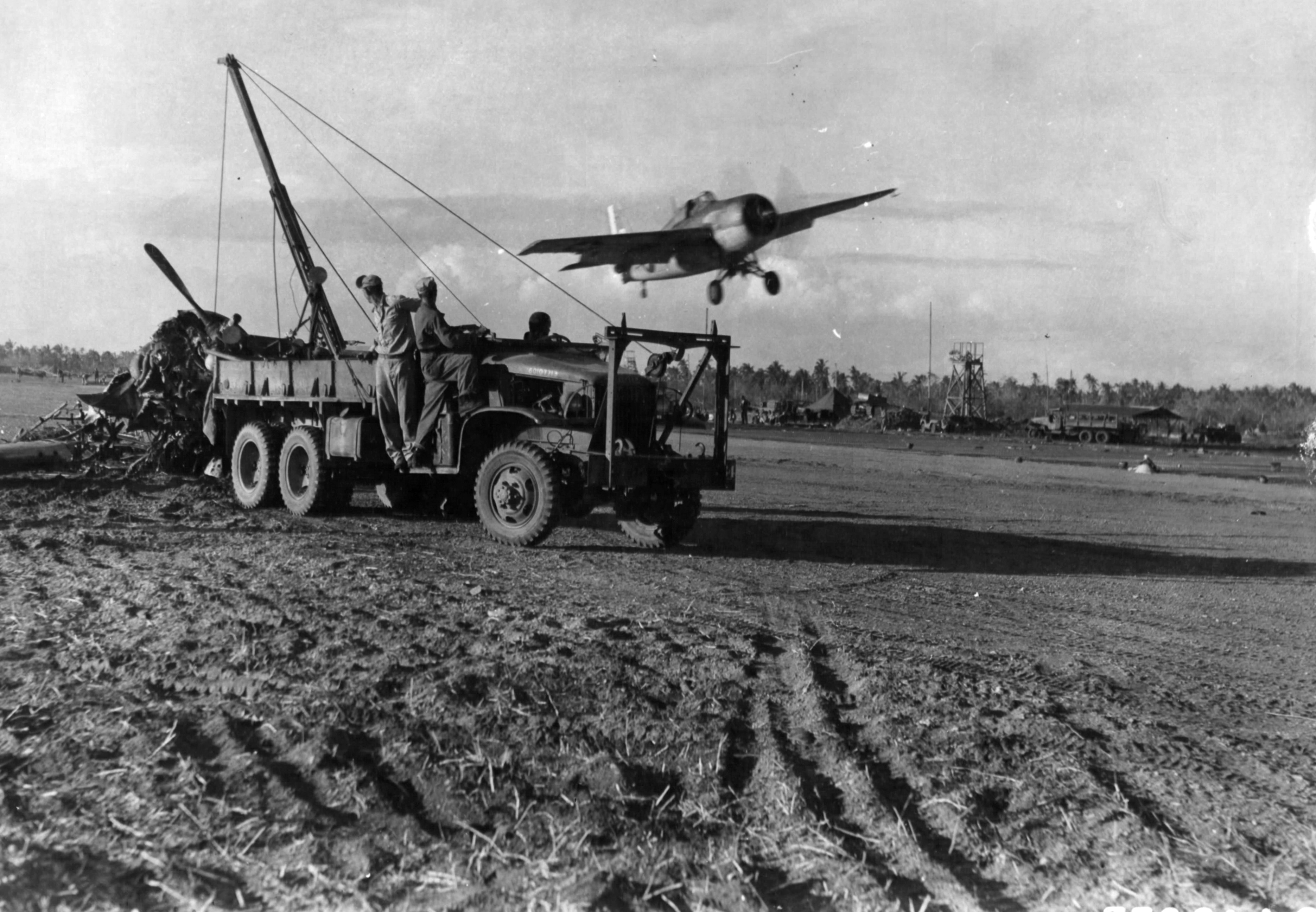 General Motors FM-2 Wildcat VC-99 takes off from Tacloban Leyte Island PI 01