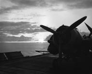 Asisbiz Wildcat high lighted by the morning glory somewhere in the Atlantic 31st Aug 1943 01