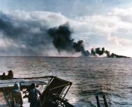 Asisbiz Japanese cruisers shell USS Gambier Bay (CVE 73) seen by USS White Plains (CVE 66) off Leyte Gulf 25th Oct 1944 80 G 384160