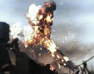 Asisbiz Japanese kamikaze with flaming gasoline fumes disintegrates over USS Intrepid (CV 11) 25th Nov 1944 NH 58029