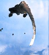 Asisbiz Japanese plane in flames after being hit by AA fire whilst attacking the USS Hornet (CV 12) 01