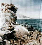 Asisbiz USS Belleau Wood (CVL 24) after she was hit by a Kamikaze off the Philippines on 30th Oct 1944 80 G 342020