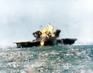 Asisbiz USS Essex (CV 9) being hit by a Japanese Judy during Kamikaze attacks off Luzon 25th Nov 1944 80 G 273032