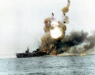 Asisbiz USS ST Lo (CVE 63) after she was hit be a Kamikaze of Samar Battle of Leyte Gulf on 25th Oct 1944 80 G 270516