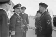 Asisbiz German U boat submarine U 93 crew member being awarded by Admiral Karl Donitz the Iron Cross ribbon 1941 01