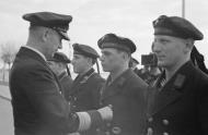 Asisbiz German U boat submarine U 93 crew member being awarded by Admiral Karl Donitz the Iron Cross ribbon 1941 03