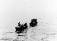 Asisbiz German U boat submarine come alongside lifeboats from the American steamer CARLTON to interrogate her captain 5th July 1942 NH 71305