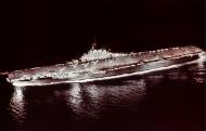 Asisbiz USS Antietam (CVS 36) launches a red painted F9F Cougar jet fighter during night operations circa 1953 55 80 G K 16839