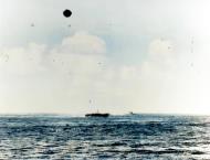 Asisbiz USS Bataan (CVL 29) being attacked by a Kamikaze plane off Okinawa on 17th March 1945 80 G 373773