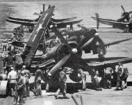 Asisbiz Vought F4U 4 Corsairs being readied aboard USS Bataan (CVL 29) for a strike against enemy supply routes during the Korean War 01