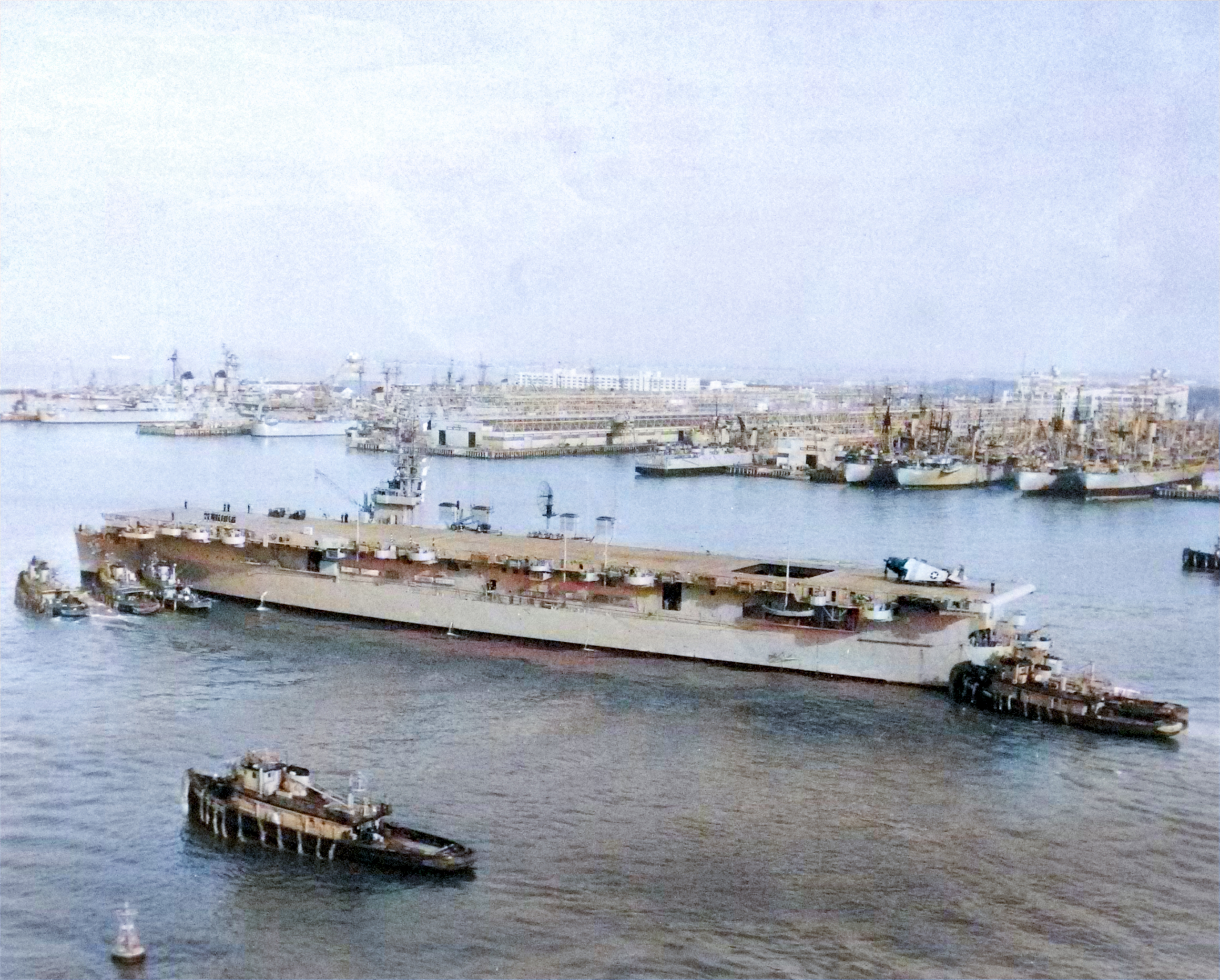 Asisbiz French aircraft carrier Bois Belleau (R97) at Naval Station Norfolk on 9 December 1953 (USN 709075)