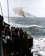 Asisbiz USS Belleau Wood (CVL 24) center and USS Franklin (CV 13) hit by Kamikaze planes off the Philippines 30th Oct 1944 80 G 273074