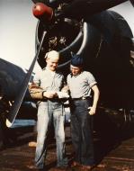 Asisbiz USS Belleau Wood (CVL 24) crew reading mail on the flight deck circa 1945 80 G K 5188