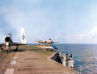 Asisbiz McDonnell F2H 3 Banshee (VMF 214) making touch and go approaches on the carrier USS Bennington (CVA 20) on 2nd Nov 1956 01