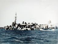 Asisbiz USS Osmond Ingram (APD 35) in camouflage measure 31 design 12T off the Charleston NY South Carolina 14th July 1944 NH 91797